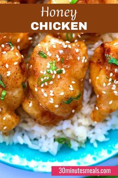 honey chicken with sesame seeds on top of rice and garnished in sesame seeds