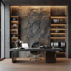 an office with stone walls and wooden flooring, along with a black desk topped with a laptop computer