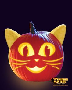 a pumpkin with a cat's face carved into it