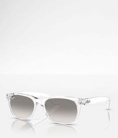 Ray-Ban New Wayfarer Sunglasses - White , Women's Transparent Transparent plastic frame sunglasses Gradient grey lenses 100% UV protection Soft shell case included. Apparel & Accessories Classic Clear Sunglasses With Anti-reflective Coating, Clear Glass Sunglasses With Uv Protection, Classic Clear Wayfarer Sunglasses, Everyday Wayfarer Glass Sunglasses, Everyday Wayfarer Sunglasses With Glass Lenses, Everyday Glass Wayfarer Sunglasses, Wayfarer Anti-reflective Glass Sunglasses, Clear Wayfarer Sunglasses With Polarized Lenses, Optic White Wayfarer Sunglasses With Tinted Lenses