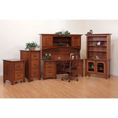 Master Office Collection Dimensions: 73"W x 26"D x 71"H Kneehole: 26"W x 23"H Select Your Wood & Finish Whether you have distinct taste, or something you would like to match, our QW Amish program allows you to hand-pick the final details. Check out the Wood species and Finish options to customize your unique piece. Shown in Quarter Sawn White Oak with our Michael's Cherry 113 Finish. Features: Front of desk top and legs curved Hutch has 16" clearance at sides arching to 18" in center Center pencil drawer Dovetailed drawers Fill extension slides on drawers Letter file on each side Light top center of hutch with glass shelf 1 shelf behind doors 1/4" plywood back Amish Hand-Crafted Solid Wood Construction Standard Hardware: Pull D521-BL, Knob D523-BL Amish quality is well worth the wait. Plea Master Student, Fire Table Patio, Fireplace Media Console, Curved Desk, Keyboard Drawer, Double Pedestal Desk, Adirondack Chairs Patio, Gathering Table, Student Desk