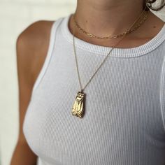 Buy in 14K Gold. For thousands of years, the cicada has been a symbol of change, renewal, rebirth, metamorphosis, and transformation. Instead of one major metamorphosis, the cicada's 17-year life is marked by multiple moltings (or sheddings of old layers). On its 5th molting, it finally leaves the ground to emerge into the light.From there, they use their large eyes to seek full awareness of their surroundings. Through powerful song and strong communication, they show us what it is to use voice Cake Pull Charms, Cicada Necklace, Symbol Of Change, Bee Pendant, Large Eyes, First Humans, Birthstone Bracelets, Birthstone Earring, Garden Inspired