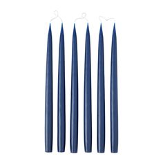 three blue candles sitting next to each other