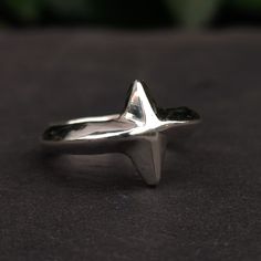 A thin sterling silver north star ring Handcrafted from 100% recycled 925 sterling silver Features straight beveled edges which catch the light at different angles Unisex design Wax Cast Rings Sterling Silver, Star Rings Jewelry, Men’s Jewlery Silver, Mens Silver Rings Handmade, Galaxy Rings, Silver Rings Men, Bali Aesthetic, North Star Ring, Mens Sterling Silver Jewelry