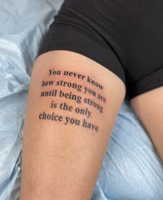 a woman with a tattoo saying you never know how strong you are until being strong is the only choice you have