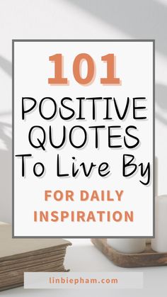 the words, 101 positive quotes to live by for daily inspiration on top of books