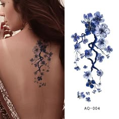 the back of a woman's neck with blue flowers on it and an image of a