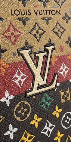 the louis vuitton logo is on top of a multicolored purse