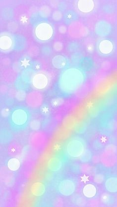 a rainbow colored background with white stars and sparkles on it's sides, as well as the colors of the rainbow