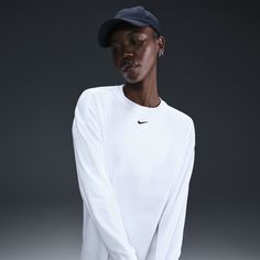 With dropped shoulders and heavyweight cotton, this spacious tee might be your new go-to. Nike Shirts Women's, Nike Shirt, Swoosh Logo, Women Lifestyle, Nike Shirts, White Nikes, Nike Sportswear, Active Wear For Women, Long Sleeve Tshirt