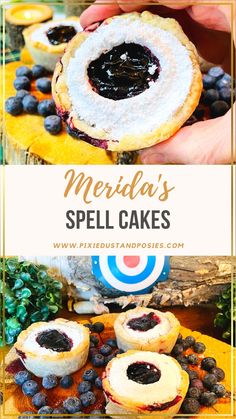 a person holding a pastry with blueberries on it and the words merida's spell cakes above it