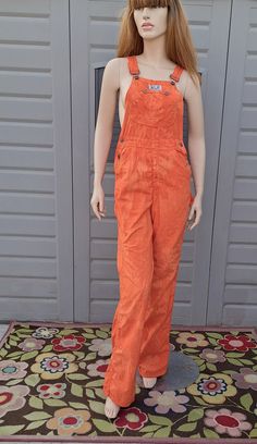 Cute pair of Vintage 70's  A Smile cotton overalls.   I hand dyed them in orange with a mottled tie dye look  and they look fabulous.    Small stain on back pocket and lower back leg aottom back leg as shown.   They have adjustable shoulder straps and  a zipper fly.   Measurements are taken with item laying flat so widths across must be doubled  Length = 56.5   in   in (measured without the straps, from the top of waist down to leg hems) Across the Waist = 14  in Across the Hips =  17.5   in Acr 70s Overalls, Womens Overalls, Cotton Overalls, Overalls Women, Lower Back, A Smile, Vintage 70s, Shoulder Straps, Hand Dyeing