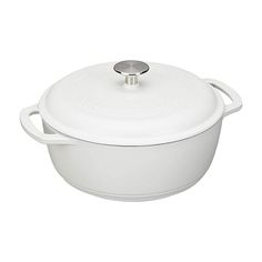 a white casserole dish with a lid and handles on the side, sitting against a white background