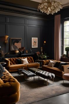 a living room filled with furniture and a chandelier