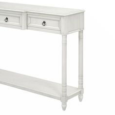 a white console table with two drawers