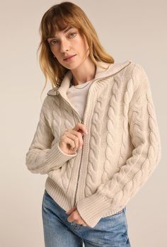 Stay snug and stylish in this cable zip cardigan, complete with an oversized collar and a soft, sweater knit feel. With its long sleeves and easy zip front, it’s the perfect piece for cozy, cool-weather layering.    Regular fit    Sweater Knit: 60% Cotton, 40% AcrylicHand Wash Cold with Like Colors, Lay Flat to Dry or Dry Clean Cable Knit Half Zip Sweater, Cozy Cable Knit Relaxed Fit Cardigan, Cozy Cable Knit Button-up Outerwear, Cable Knit V-neck Outerwear, Cheap V-neck Cable Knit Cardigan, Cable Cardigan, Zip Cardigan, Denim T Shirt, Denim Sweater