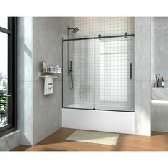 a bathroom with a walk in shower next to a window