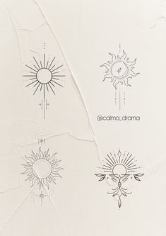 four sun and moon tattoos on white paper