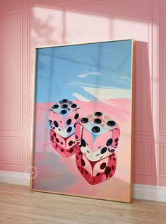 two pink dices sitting on top of each other in front of a pink wall