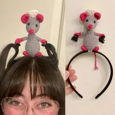 a woman with glasses and a crocheted mouse on her head