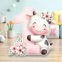 a pink number one with a cow and flowers on it