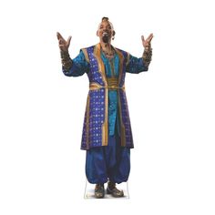 a man dressed in blue and gold with his hands up