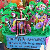 a table topped with lots of candy and decorations