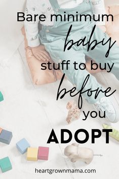 a baby sitting on top of a floor next to wooden blocks with the words, bare minimum