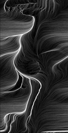 an abstract black and white photo with wavy lines