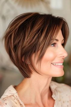 Angled Pixie Bob Hairstyle on a smiling woman in her 40s with brown hair, side view. Angled Pixie Bob, Inverted Pixie Bob, Short Auburn Hair Bob, Back View Short Hair, Haircuts For Women In 40s, Short Brown Haircuts, Angled Pixie, Hair Side View, Short Auburn Hair