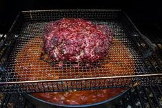 the meat is cooking on the grill in the oven, and ready to be cooked