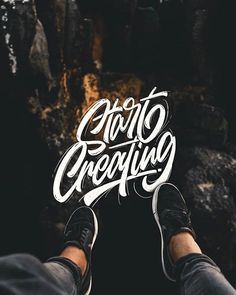 someone holding their feet up in front of the camera with graffiti writing on it that says, chaotic dreaming