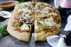 a pizza sitting on top of a metal pan