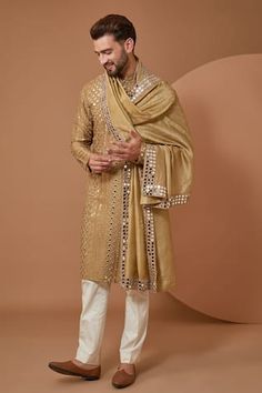 Beige silk kurta with mirror work. Comes along with a stole with mirror work border. Components: 2 Pattern: Embroidery Type Of Work: Mirror Neckline: Stand Collar Sleeve Type: Full Sleeves Fabric: Silk Color: Beige Other Details:  Note: Pant worn by the model is not for sale Occasion: Sangeet - Aza Fashions Stole For Men, Embroidery Mirror, Sangeet Outfit, Gents Kurta, Kurta Pant Set, Mens Kurta Designs, Silk Kurta