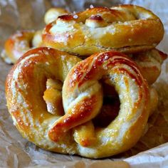 some pretzels are sitting on wax paper