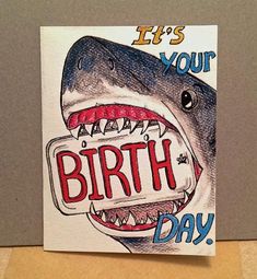 there is a card with a drawing of a shark and the words, it's your birth day