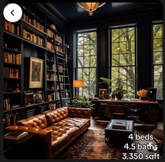 a living room filled with furniture and bookshelves next to a window covered in lots of windows