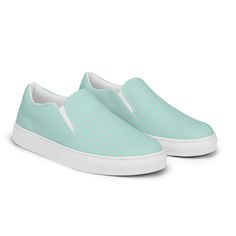 Made for comfort and ease, these Women’s Slip-On Canvas Shoes are stylish and the ideal piece for completing an outfit. Equipped with removable soft insoles and rubber outsoles, it’s also easy to adjust them for a better fit. • 100% polyester canvas upper side • Ethylene-vinyl acetate (EVA) rubber outsole • Your brand on the box, insole, and tongue of the shoe • Breathable lining, soft insole • Elastic side accents • Padded collar and tongue • Printed, cut, and handmade • Blank product sourced f Sporty Low-top Summer Slip-ons, Summer Slip-on Sneakers With Vulcanized Sole, Sporty Slip-ons With Textured Sole For Summer, Sporty Summer Slip-ons With Rubber Sole, Summer Low-top Slip-on Sneakers With Cushioned Footbed, Casual Blue Slip-ons With Contrast Sole, Summer Sporty Slip-on Sneakers, Summer Low-top Loafers With Rubber Sole, Comfortable Slip-ons With Contrast Sole For Spring