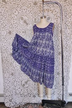 A lovely Indian gauze tent dress in soft light purple cotton fabric and a flowing silhouette. It features tiers and a front yoke, as well as piping along the neckline and arm openings! A classic piece of 1980's bohemian gauze, this breezy dress is perfect for everyday wear, and in excellent sturdy condition (rare for these Indian gauze beauties) It is marked size medium, but would best fit a size small, see measurements for details. All measurements taken flat across. Measurements Bust: 19" Hip: 29" Length: 44" Breezy Dress, Tent Dress, Soft Light, Dress Clothes For Women, Soft Lighting, Light Purple, Piping, Tent, Everyday Wear