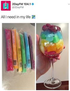 a hand holding a wine glass filled with different flavored candy bars and the caption reads, just add vodka