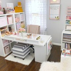 a white desk topped with lots of drawers