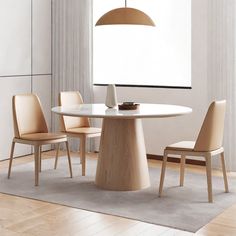 a white table with four chairs around it