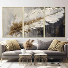 Embrace the sophistication of abstract art with our stunning three-piece set, featuring elegant gold and white textured paintings. Each panel is a masterpiece of design, encased in a sleek metal frame that adds a contemporary edge to your decor. Made with 100% aluminum, these pieces are not only visually striking but also built to last. The use of real unbreakable glass ensures the safety and longevity of the artwork, while the UV printing technique brings out the vibrant colors and intricate de Feathers Wall Art, Panel Artwork, Luxurious Home, White Texture, Texture Painting, Uv Printing, Bird Feathers, Three Piece, Modern Living Room