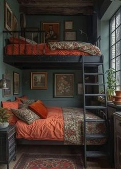 a bedroom with bunk beds and pictures on the wall