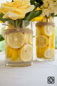 lemons and roses in mason jars with twine