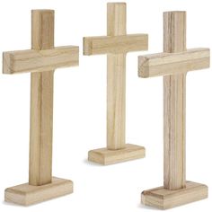 three wooden crosses sitting on top of each other