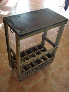 a wooden table with wine bottles on it