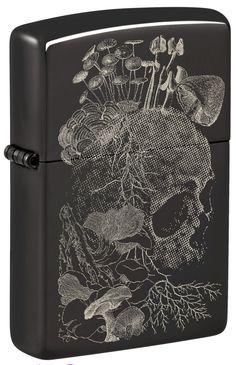 a black lighter with a skull and flowers on it