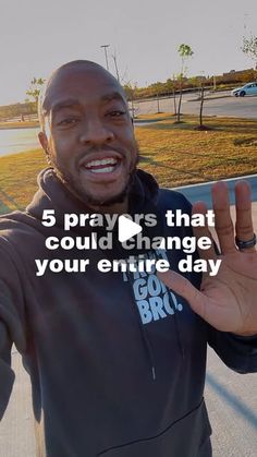 a man is holding his hand up in the air and saying, 5 prays that could change your entire day