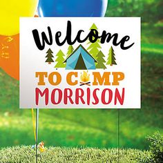 a welcome to camp sign in the grass with balloons and a tent behind it that says, welcome to camp morrison